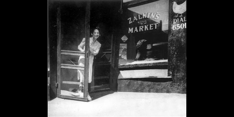 Lilly Zalkin Bebergal in the doorway of Zalkin’s Meat Market at 535 King Street, Charleston, S.C. in 1942